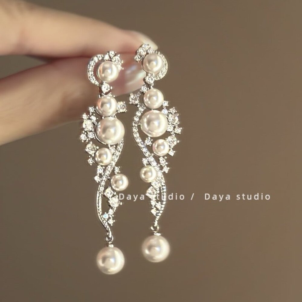 Elegant long pearl earrings